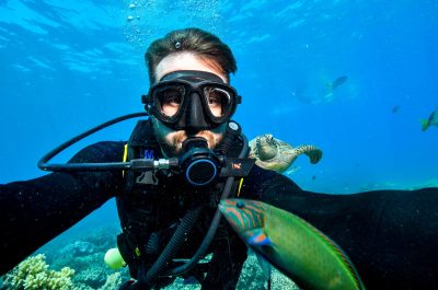 selfie of a scubadiver in tropical water